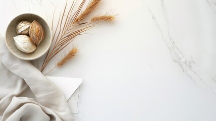 Chiaroscuro lighting highlighting dried palm leaves and pampas grass with blank notecard.