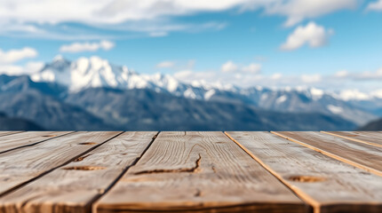 Empty wooden table with mountain view in sunny day