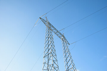 Concept of Energy and Power with an Electricity Pylon Two Electrical Towers Supporting Power Cables...
