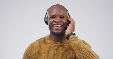 Call center, agent and portrait of black man in studio for customer support, contact us and crm....