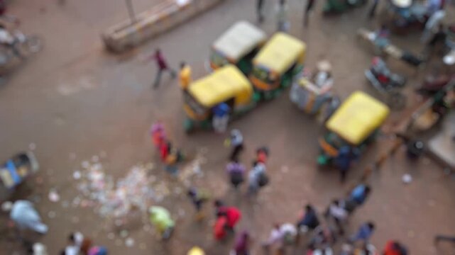 Bokeh view of people traffic near Lucknow railway station, Lucknow, India. Blurred background footage.