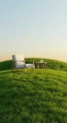 A wooden armchair and small table sit on a vibrant green hill under a clear sky
