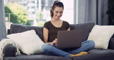Laptop, relax and woman on sofa in house with remote work for creative project online in living...