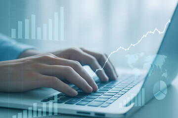 Typing on Laptop with Financial Chart Overlay for Business Analysis