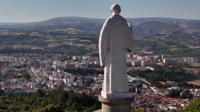 Aerial view of Saint Bartolomeu statue overlooking Braganca, Portugal