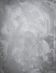A striking black and white painting featuring a dense forest of tall, slender trees, their intricate branches intertwining against a soft, textured background.