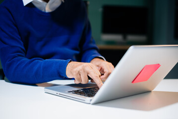 man Account Manager Working at Table with New Business Project. Typing keyboard,Using Contemporary...