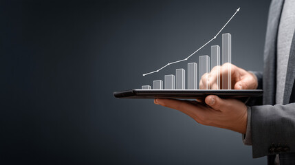 Businessman utilizing artificial intelligence for data processing in a modern office environment focusing on growth trends