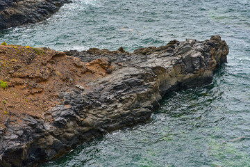 Volcanic rock in Atlantic surf