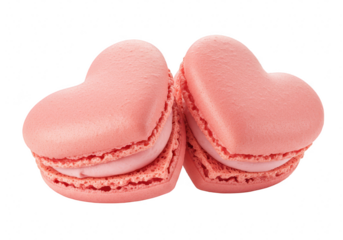 Two pink heartshaped macarons with cream filling, isolated on a transparent background