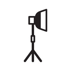 Studio light softbox icon on a tripod stand. Professional photography and video lighting equipment. Vector silhouette symbol for film production.