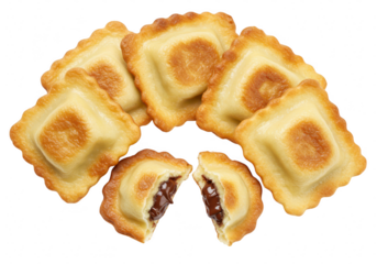 A pile of golden baked ravioli with a chocolate filling, one piece split open, isolated on a transparent background