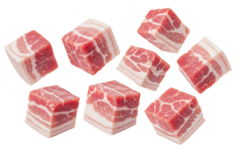 Several raw pork belly cubes with distinct layers of fat and meat, isolated on a transparent background
