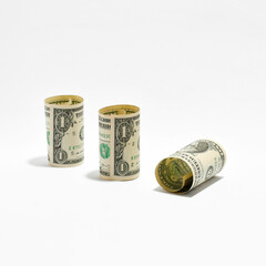 Rolled US Dollar Bills on Clean Background - Financial Instability & Savings Fluctuation