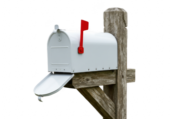 A classic white mailbox with a red flag is mounted on a weathered wooden post, isolated on a transparent background