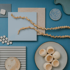 Elegant  flat lay composition in blue, brown and beige color palette with textile and paint...