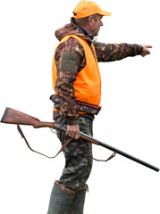 Silhouette of a hunter with a gun in the reeds against the sun, an ambush for ducks with dogs