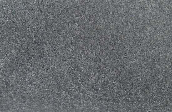 Dark gray felt texture background for design