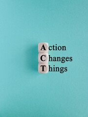 Wooden cubes with the letters A, C and T on beautiful blue background. Symbolizes the process of...