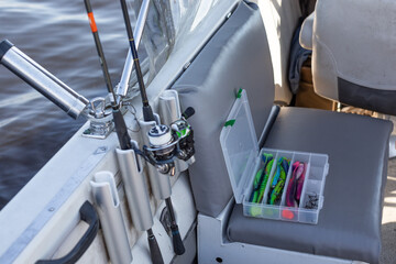 fishing lures and accessories, twitching lures, twitch baits on a wooden background, spinning,...