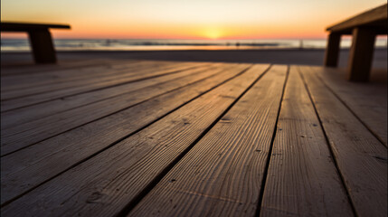 A wooden deck stretches toward the horizon, bathed in warm sunset light with a soft glow.