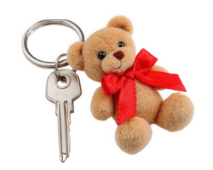 Teddy bear keychain with red ribbon, plush toy accessory, cute and soft, isolated on transparency background, metal key attached, playful and charming gift idea