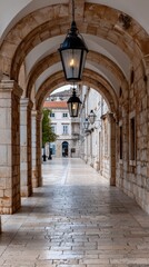 Fototapeta premium Exploring the breathtaking cloister of the Monastery in Dubrovnik with stunning views of the walled city and surrounding mountains on a sunny day