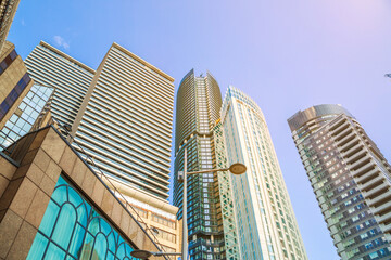 Fototapeta premium London, South dock of Canary Wharf view at sunset, residential development 