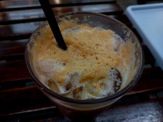 A refreshing thai tea drink with a sweet blend of milk and tea.