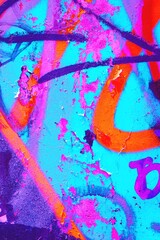 Vibrant neon graffiti texture with pink, blue, orange shades. 90s, Y2K aesthetic, fluorescent, bold...