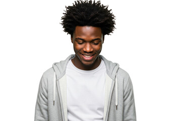 A happy black man wearing a hoodie and tshirt smiles joyfully while looking down, isolated on a transparent background