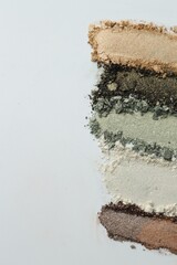 Colorful eyeshadows on white background, flat lay. Space for text