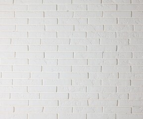 Texture of white brick wall as background, closeup