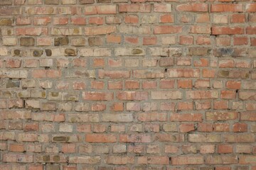 Texture of old red brick wall as background, closeup