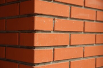 Texture of red brick wall as background, closeup