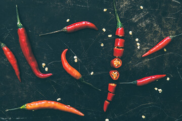 Tabasco chillies on an old metal tray background