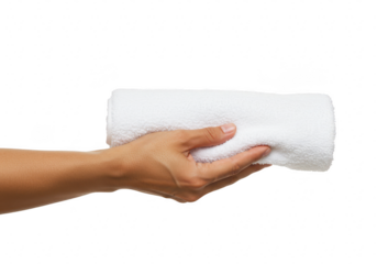 A hand holds a soft white towel isolated on a transparent background