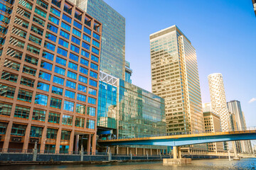 Obraz premium London,: Corporate buildings in South dock Canary Wharf at sunset 