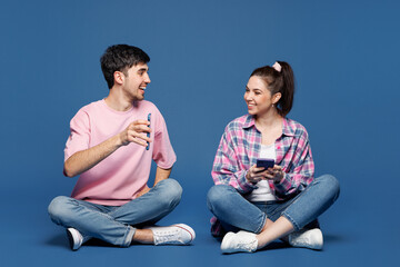 Full body young smiling couple two friends family man woman they wear pink casual clothes together...