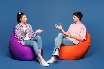 Full body young smiling happy couple two friends family man woman they wearing pink casual clothes...