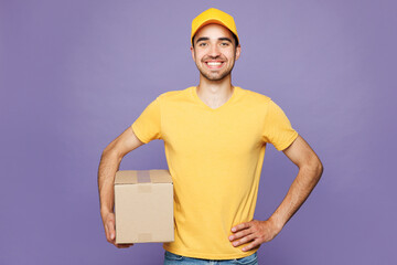 Professional delivery guy employee man wear yellow cap t-shirt uniform workwear work as dealer...