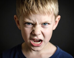 Angry child face close-up