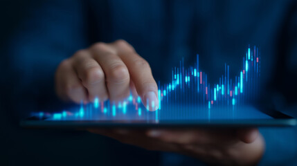 Hands editing a holographic trading chart on devices