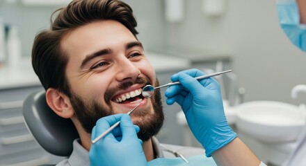 Young Man Receiving a Dental Checkup: Dentist Using Tools to Examine Teeth in Modern Dental Clinic