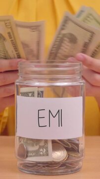 Vertical Video of Saving Money for EMI