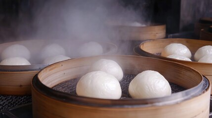 Steaming buns in bamboo baskets