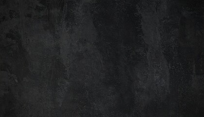 細かな傷と粒子が広がる黒いコンクリート背景
