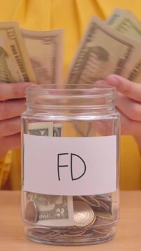 Vertical Video of Saving Money for FD