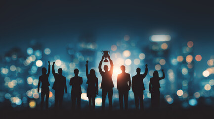 A trophy is held high as a team member is applauded, representing employee recognition and the achievement of success, celebrated by a group of cheering colleagues.