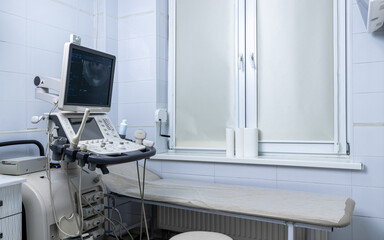 Modern Ultrasound Examination Room Showing Diagnostic Equipment and Clean Environment for Medical Imaging Procedures